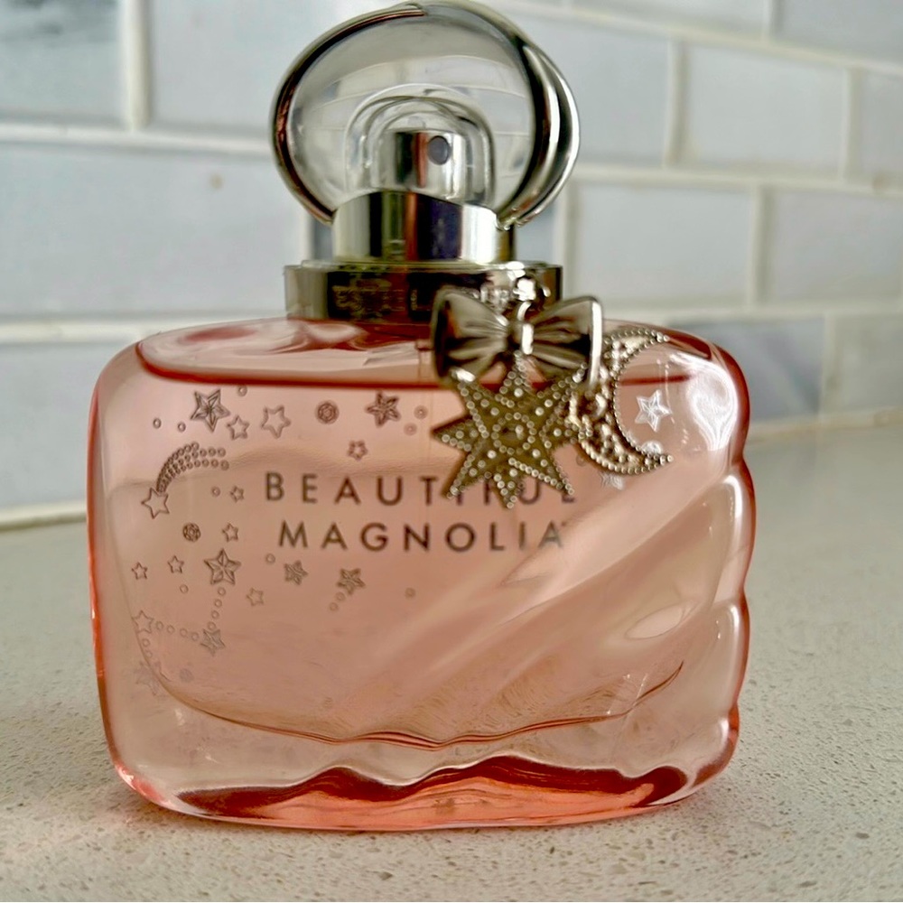 LTD bottle. LIKE NEW blend with notes of Magnolia, Gardenia, Woods & Musk.